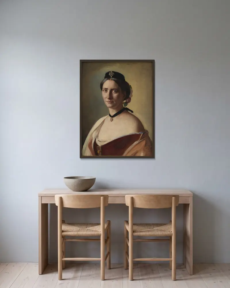 The artist’s wife, Mrs. Alma Bloch, nee Trepka av Carl Bloch inramad på en vägg