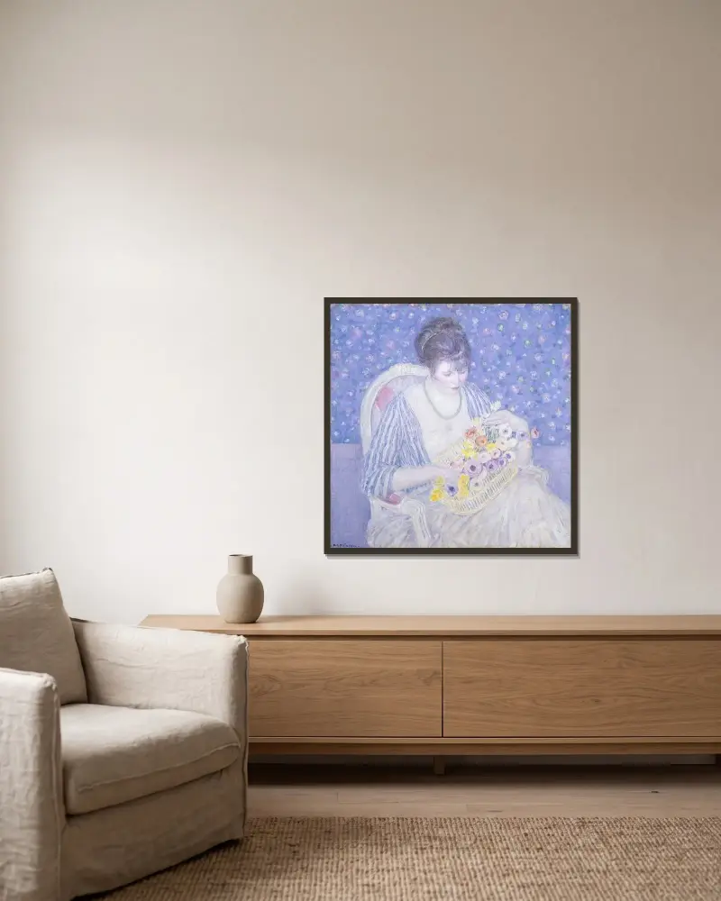 Blomsterkorgen av Frederick Carl Frieseke inramad på en vägg