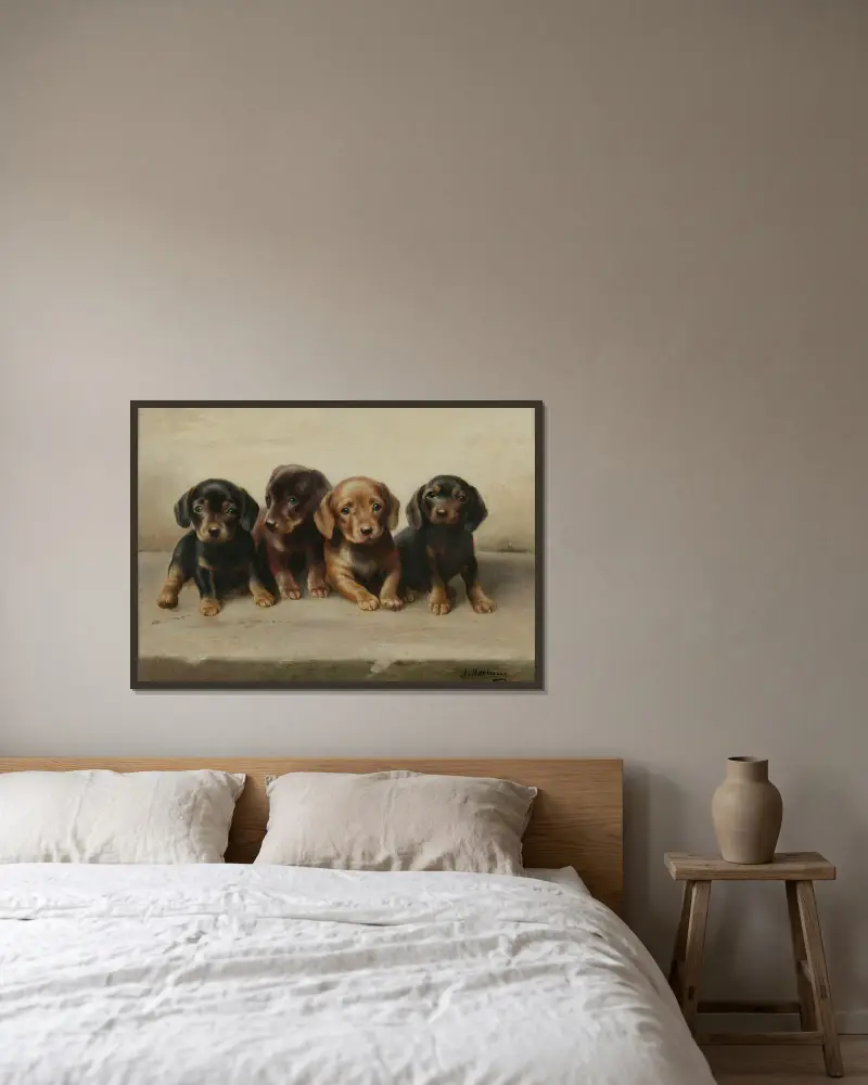 Four Dachshund puppies av Carl Reichert inramad på en vägg