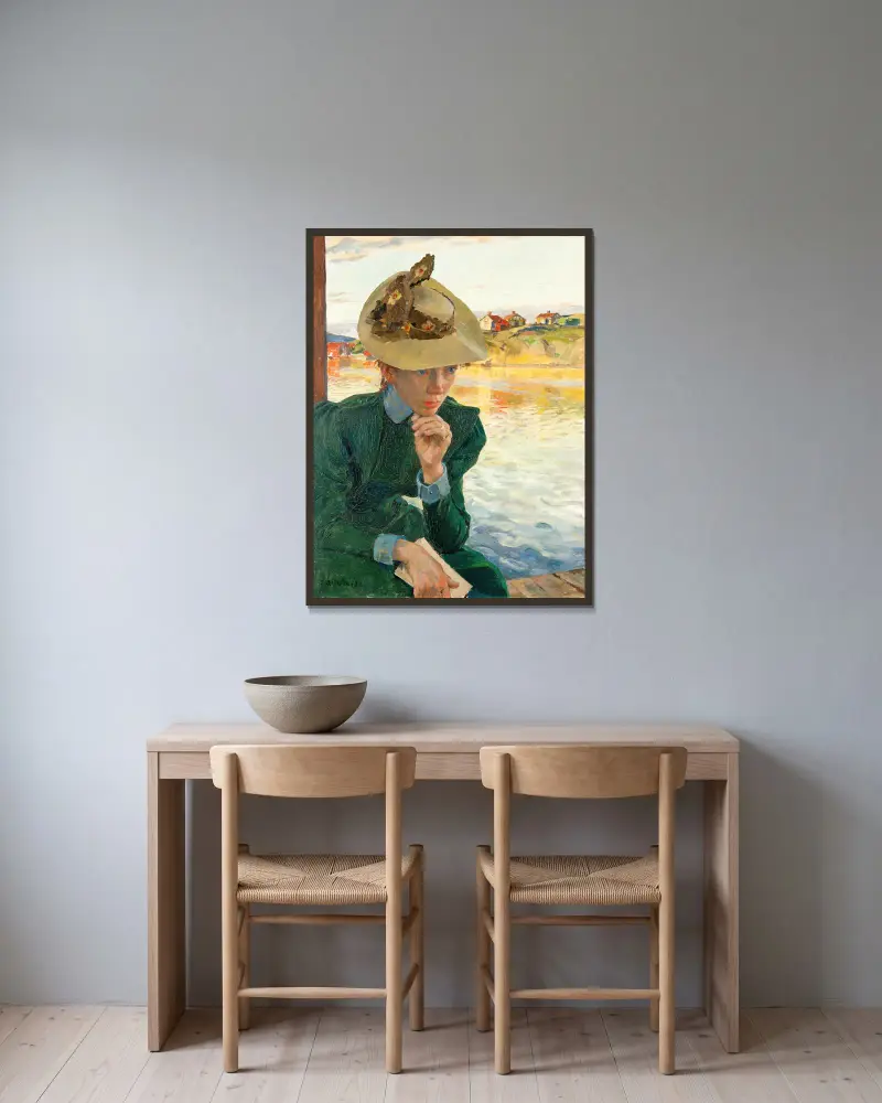 Scen från den svenska västkusten av Carl Wilhelmson inramad på en vägg