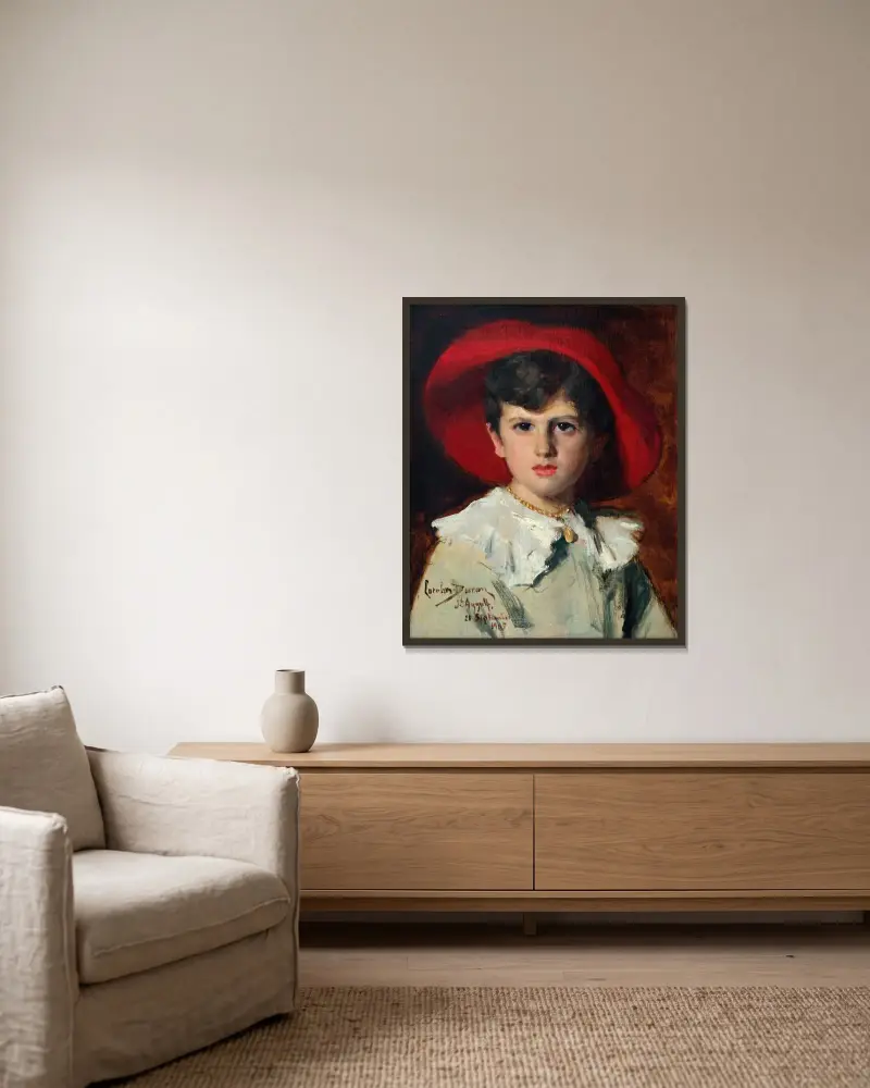 Barn i röd hatt (Michel Feydeau, son till Georges) av Carolus-Duran inramad på en vägg