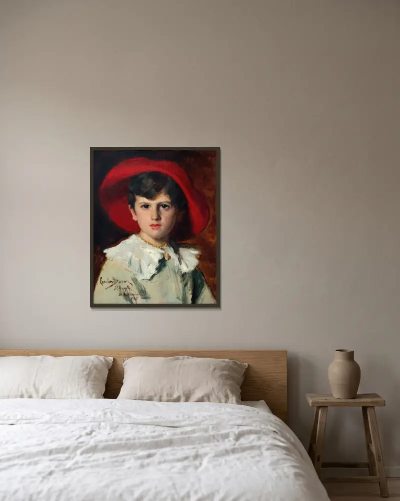 Barn i röd hatt (Michel Feydeau, son till Georges) av Carolus-Duran inramad på en vägg