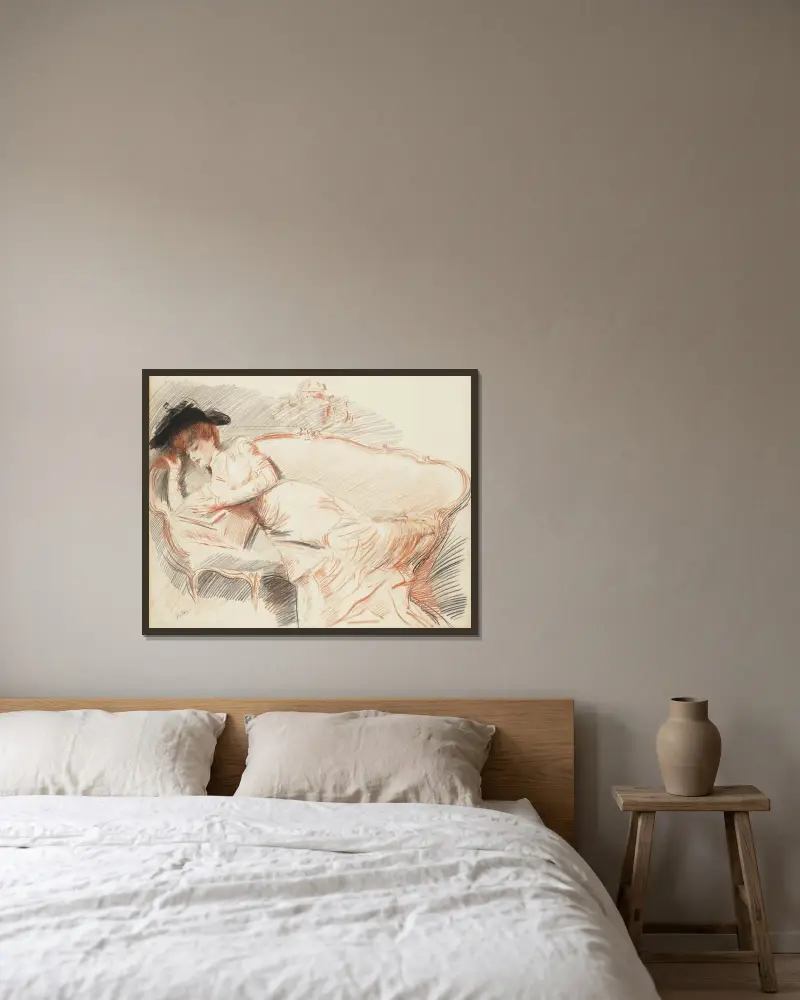 Elegant dam läsande i soffa av Paul César Helleu inramad på en vägg
