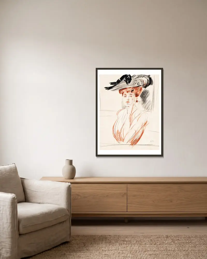 La dame au chapeau aux plumes av Paul César Helleu inramad på en vägg