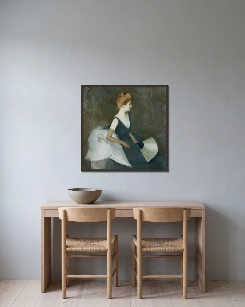 Madame Marthe Letellier sittande i soffa med solfjäder av Paul César Helleu inramad på en vägg
