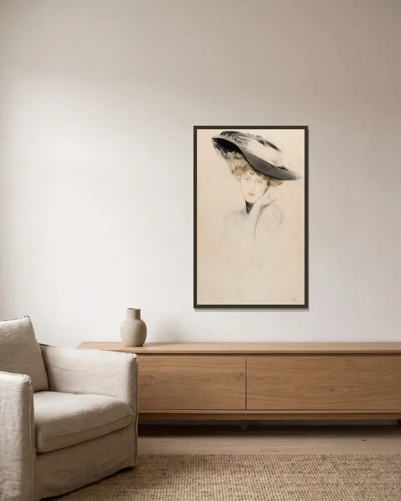Damenbildnis mit Hut von Paul César Helleu gerahmt an einer Wand