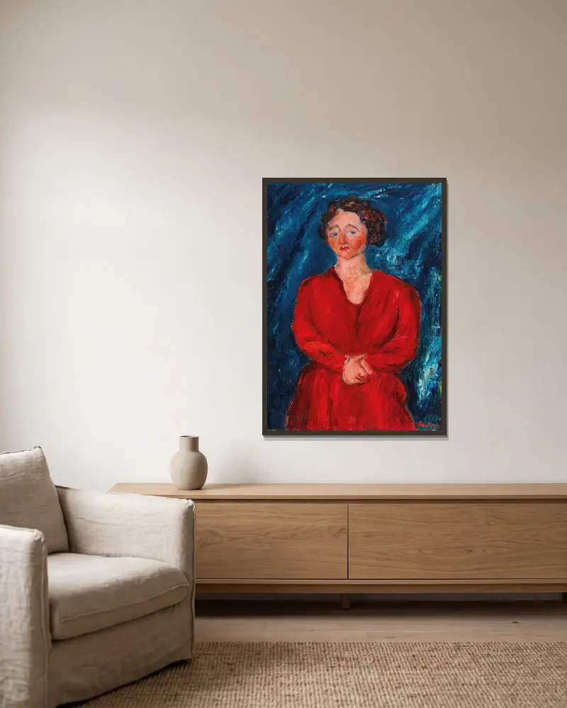 Kvinna i rött mot blå bakgrund av Chaïm Soutine inramad på en vägg