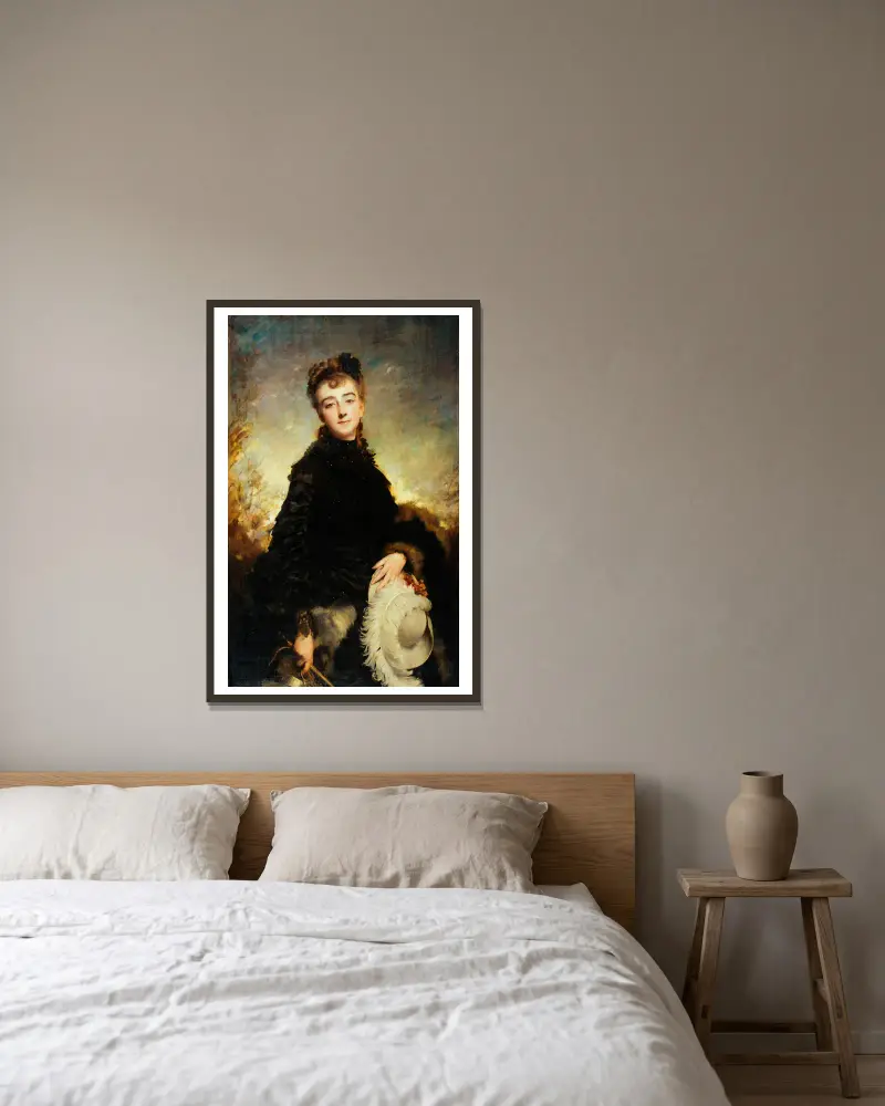 Frauenporträt von Charles Chaplin gerahmt an einer Wand