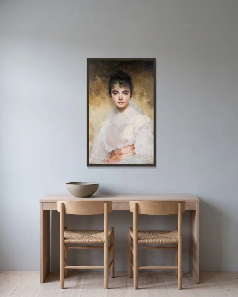 Porträtt av en ung kvinna av Charles Chaplin inramad på en vägg
