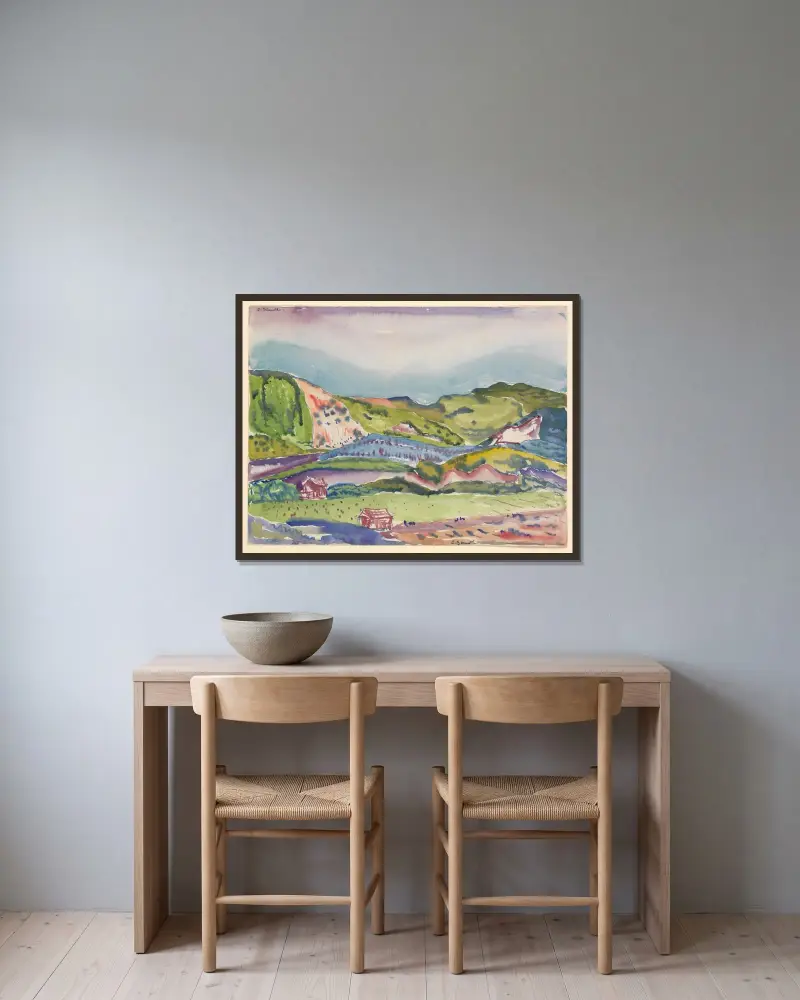 Berg med rött hus av Charles Demuth inramad på en vägg