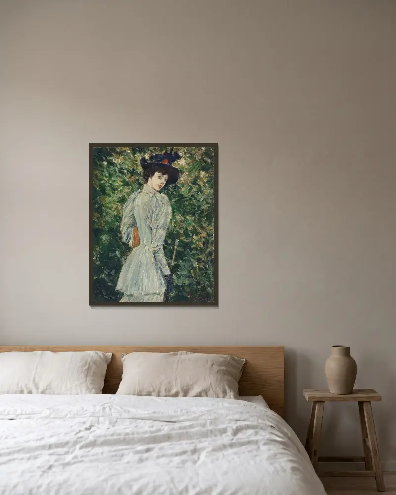 Dam i trädgård av Childe Hassam inramad på en vägg