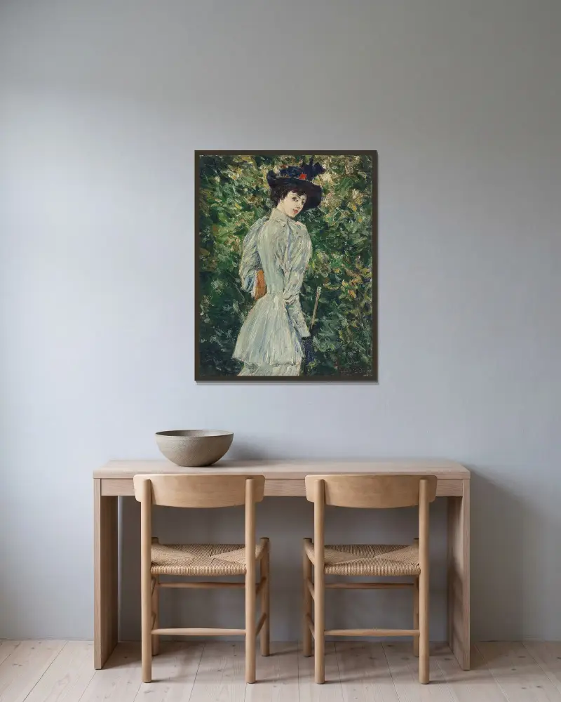 Dam i trädgård av Childe Hassam inramad på en vägg