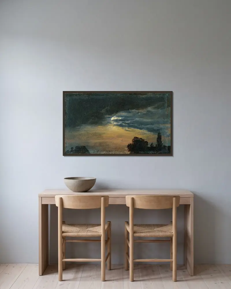 Moln i månsken av Johan Christian Dahl inramad på en vägg