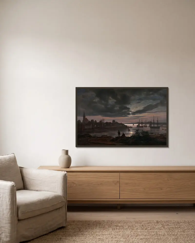 Larvik i månsken av Johan Christian Dahl inramad på en vägg