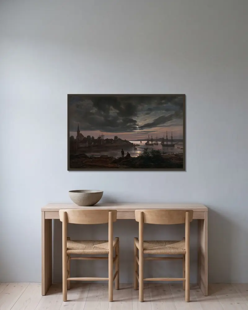 Larvik i månsken av Johan Christian Dahl inramad på en vägg