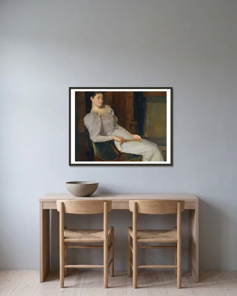 Girl In White av Christian Krohg inramad på en vägg