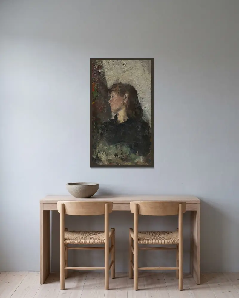 Porträtt av målaren Oda Krohg av Christian Krohg inramad på en vägg