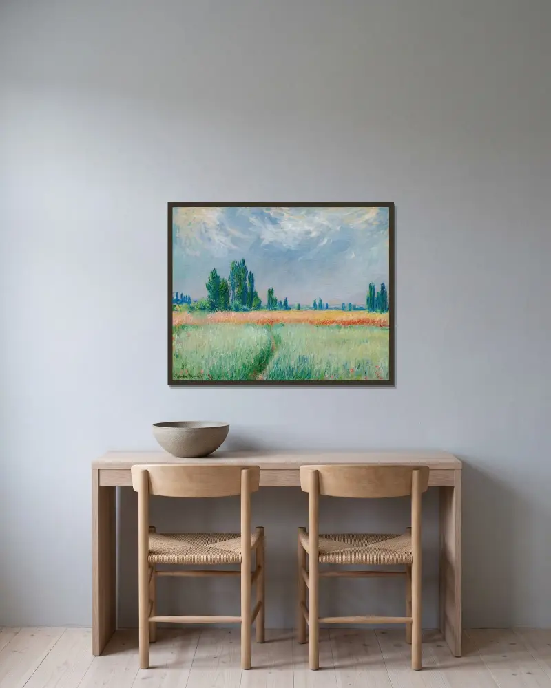 Weizenfeld von Claude Monet gerahmt an einer Wand