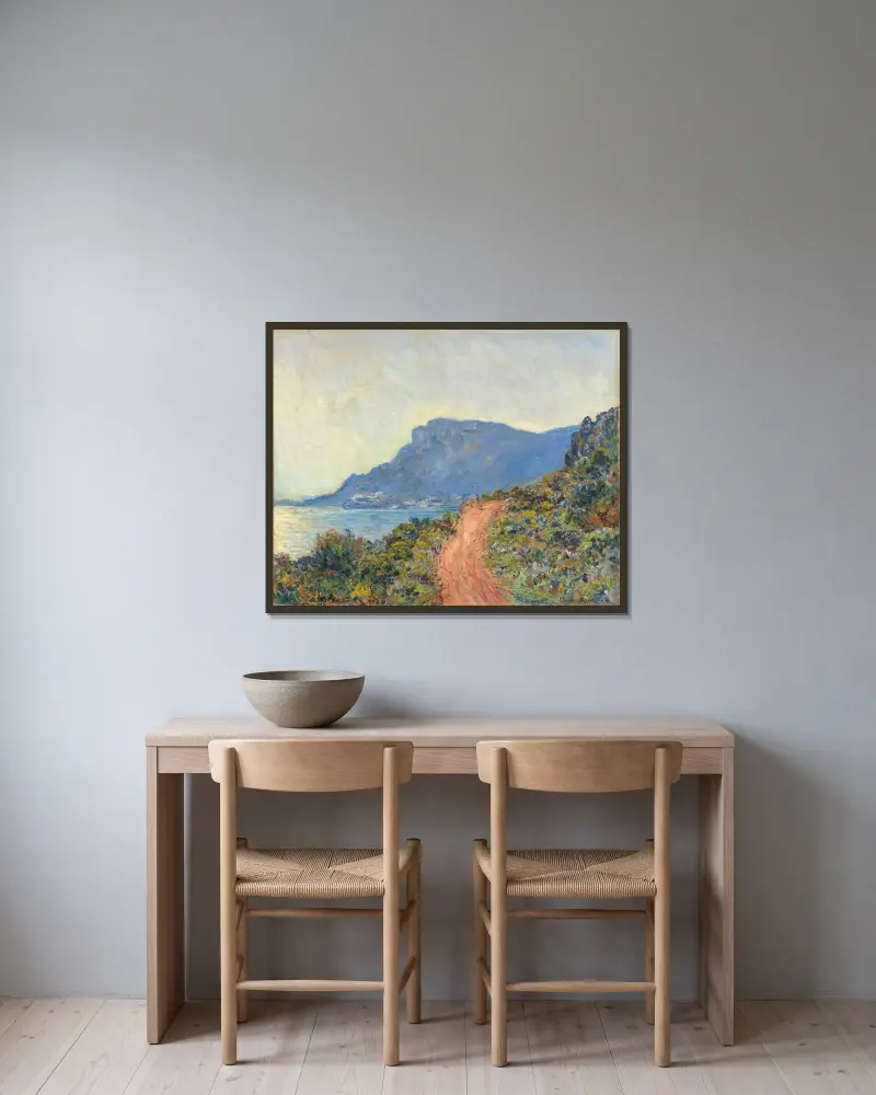 Die Küstenstraße bei Monaco von Claude Monet gerahmt an einer Wand