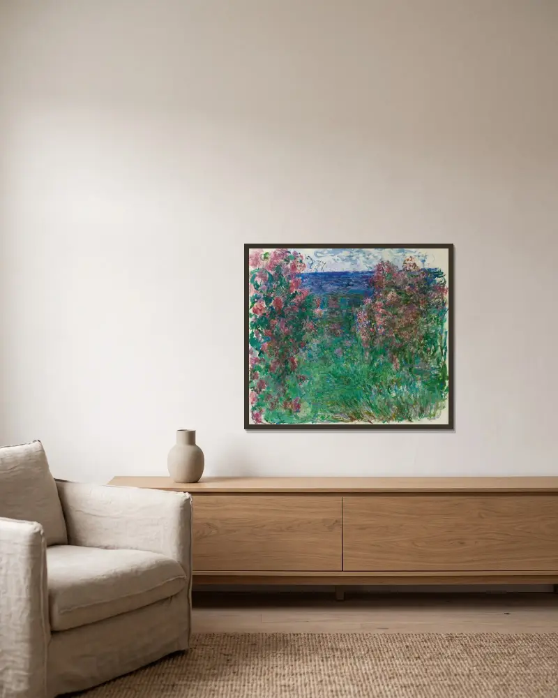 La Maison Dans Les Roses – nr 1 av Claude Monet inramad på en vägg