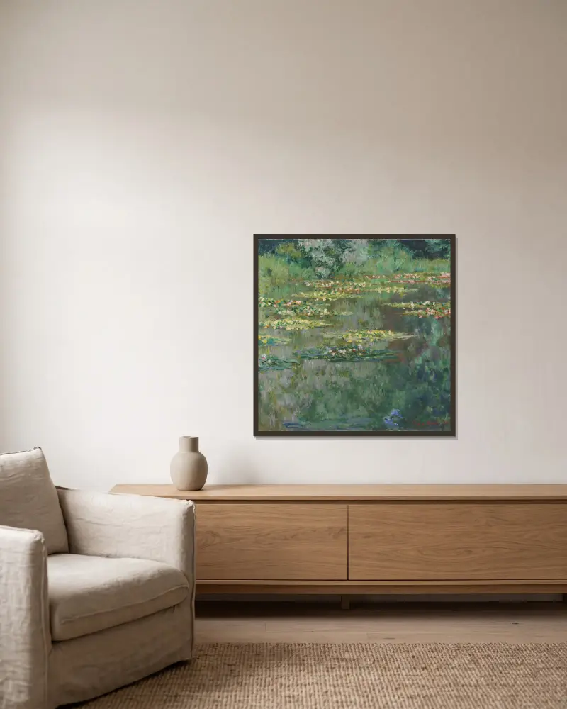 Le Bassin des Nympheas av Claude Monet inramad på en vägg