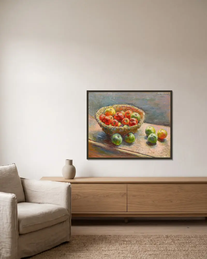 Der Apfelkorb von Claude Monet gerahmt an einer Wand