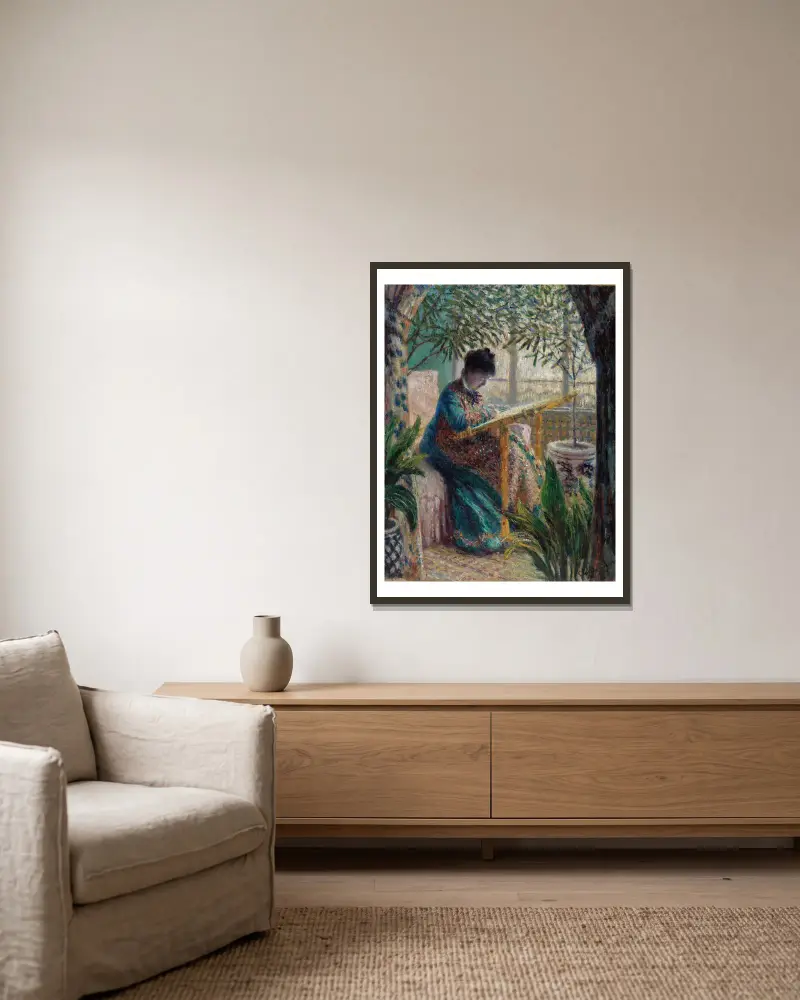 Madame Monet beim Sticken (Camille am Stickrahmen) von Claude Monet gerahmt an einer Wand