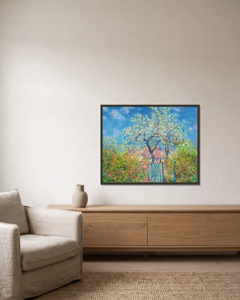 Blühender Birnbaum von Claude Monet gerahmt an einer Wand