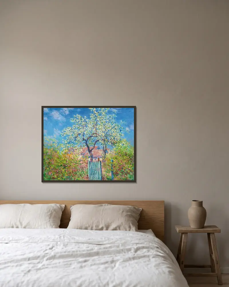 Blühender Birnbaum von Claude Monet gerahmt an einer Wand