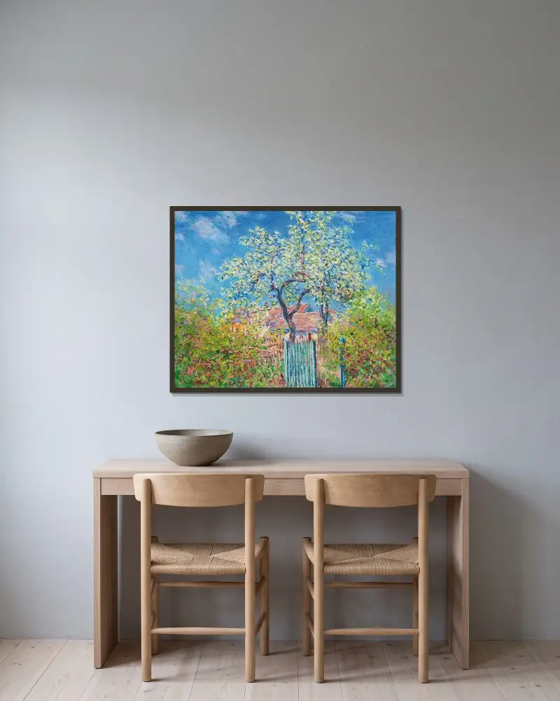 Blühender Birnbaum von Claude Monet gerahmt an einer Wand