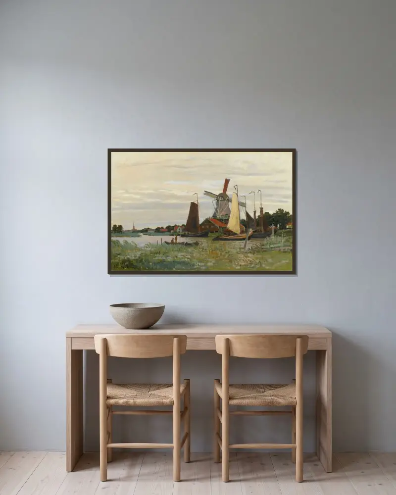 Un Moulin À Zaandam av Claude Monet inramad på en vägg