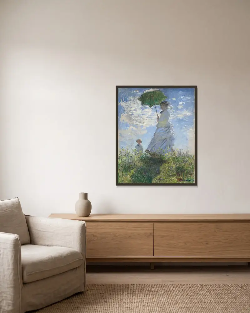 Kvinna med parasoll av Claude Monet inramad på en vägg