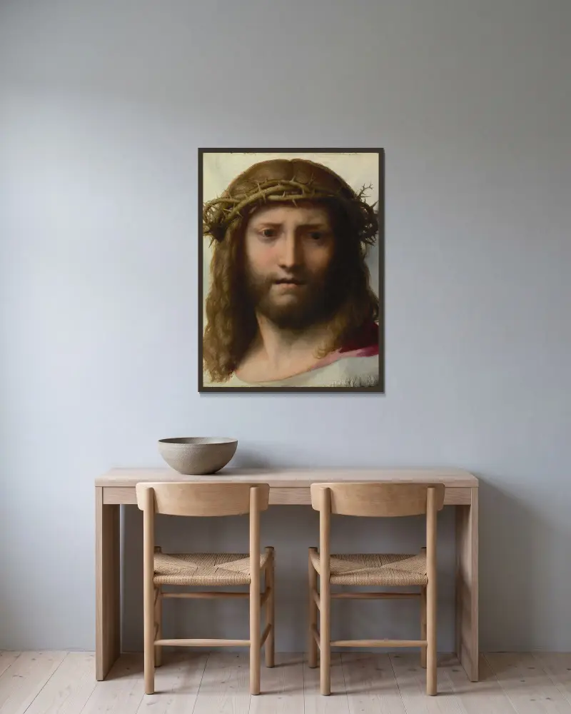 Head of Christ av Correggio inramad på en vägg