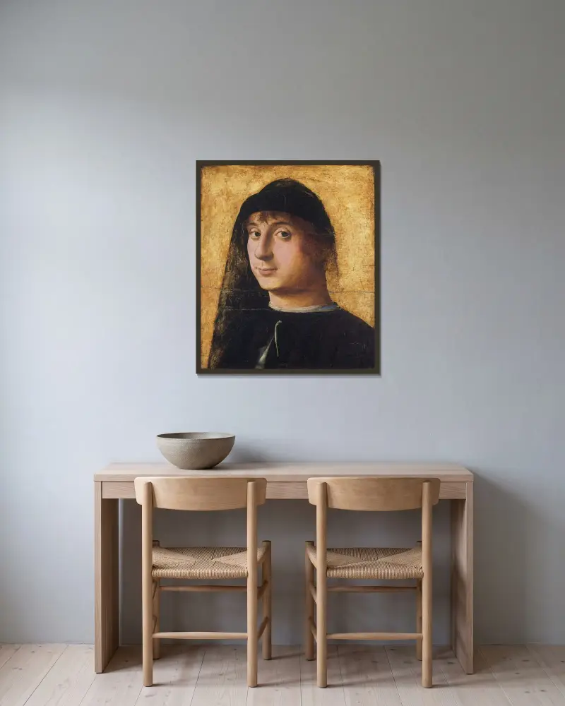 Portrait of a Young Gentleman av Antonello da Messina inramad på en vägg