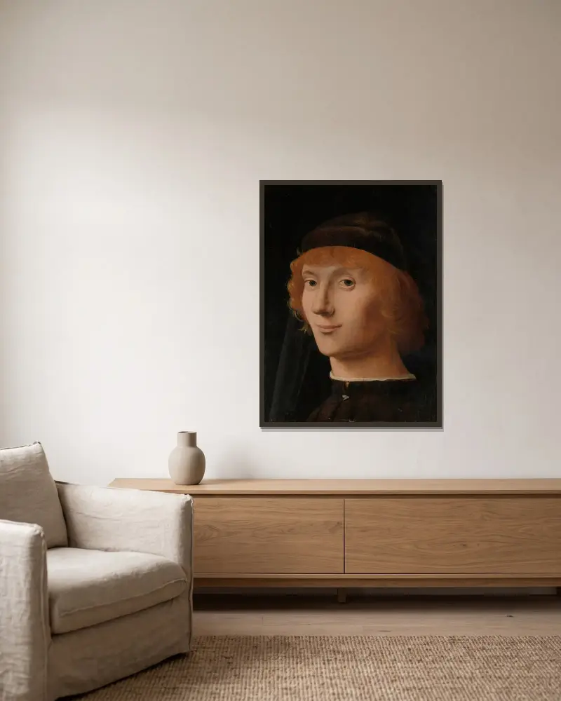 Portrait of a Young Man av Antonello da Messina inramad på en vägg