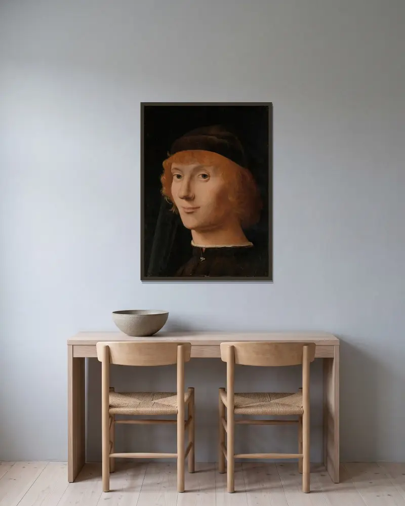 Portrait of a Young Man av Antonello da Messina inramad på en vägg