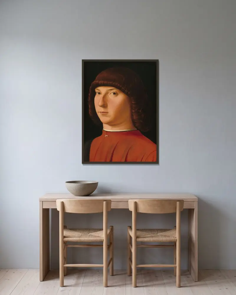 Portrait of a Young Man av Antonello da Messina inramad på en vägg