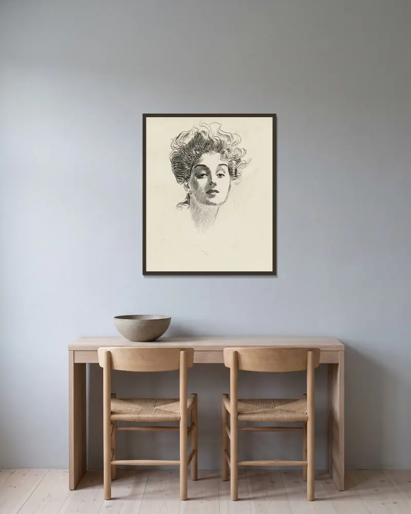 Flickhuvud av Charles Dana Gibson inramad på en vägg