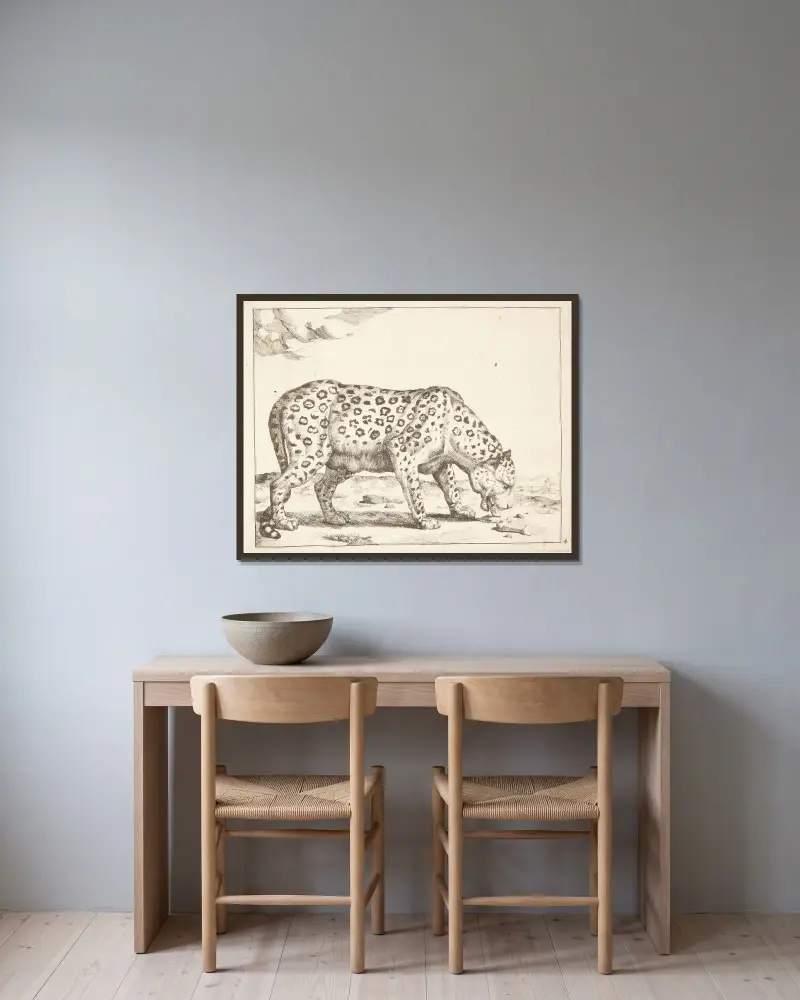 Leopardin von Marcus de Bye gerahmt an einer Wand