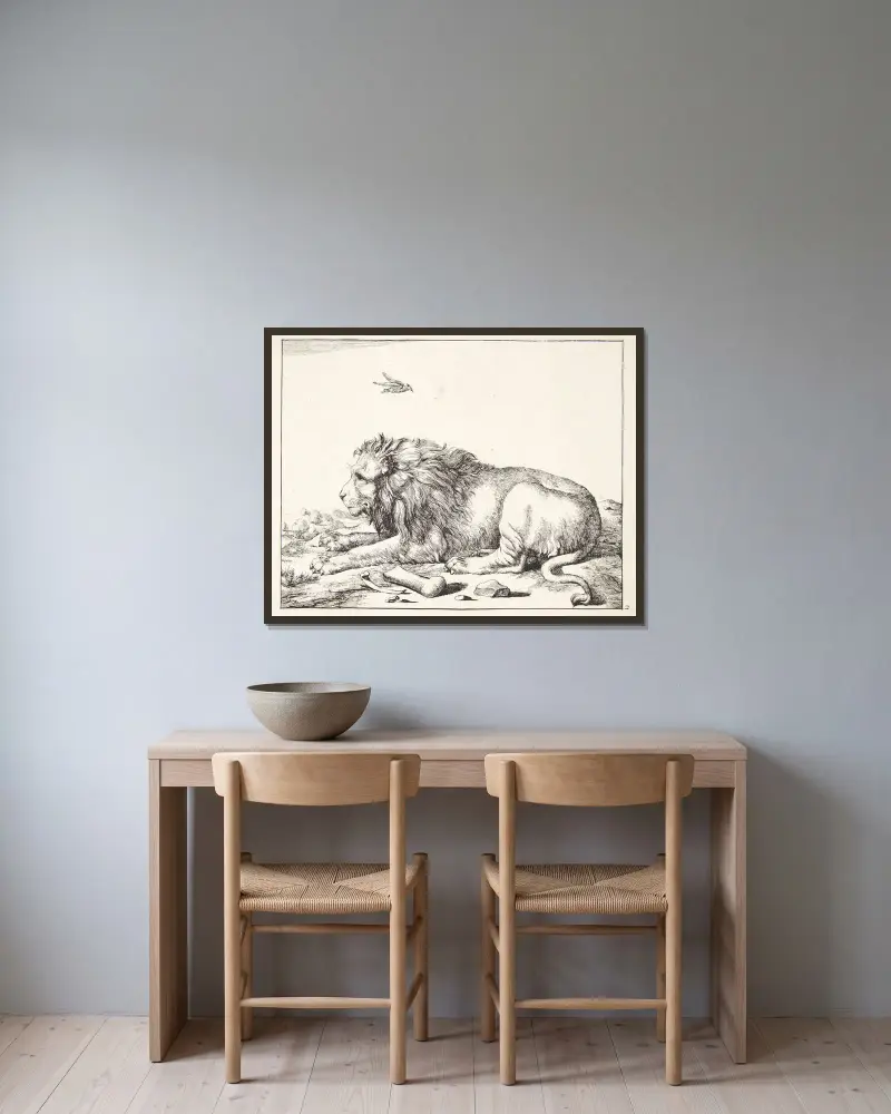 Liegender Löwe von Marcus de Bye gerahmt an einer Wand