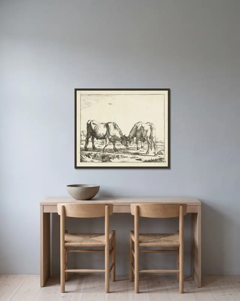 Zwei Stiere, Kopf an Kopf von Marcus de Bye gerahmt an einer Wand