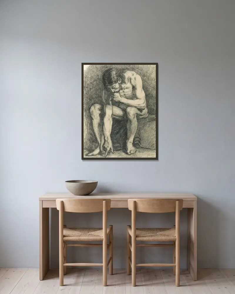 Sittande man som skriver på marken med fingret av Pierre Puvis de Chavannes inramad på en vägg