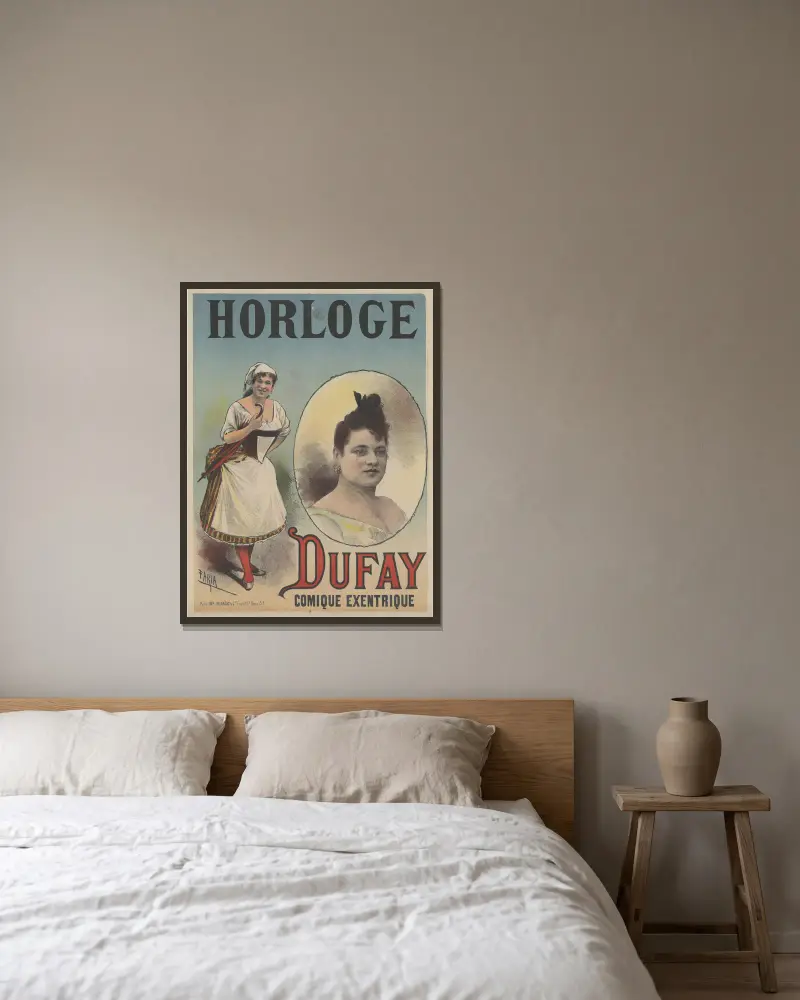 Horloge Dufay comique excentrique av Cândido de Faria inramad på en vägg