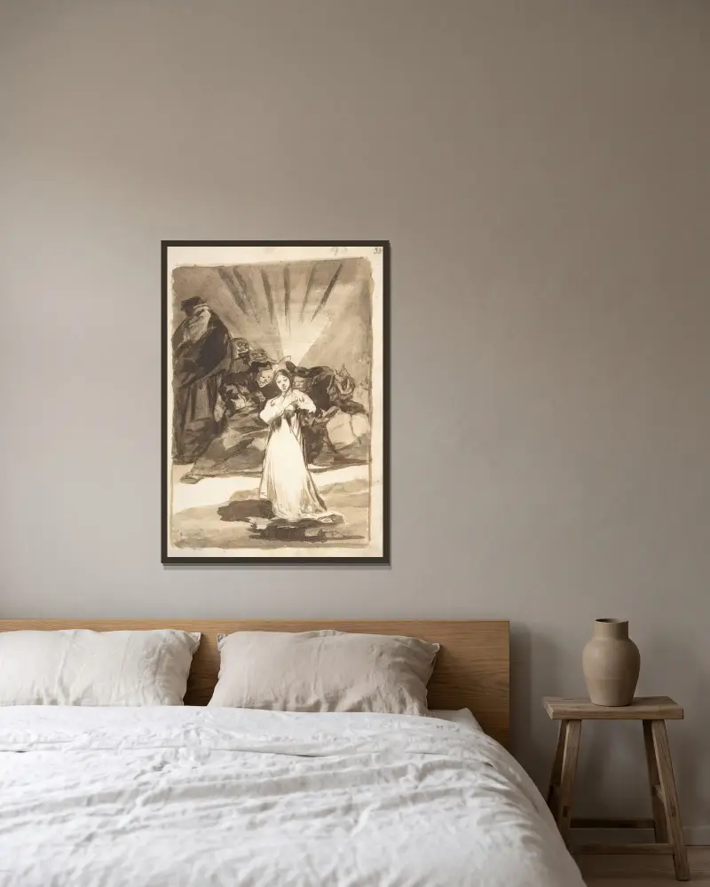 En strålande kvinnogestalt ansatt av mörka andar av Francisco de Goya inramad på en vägg