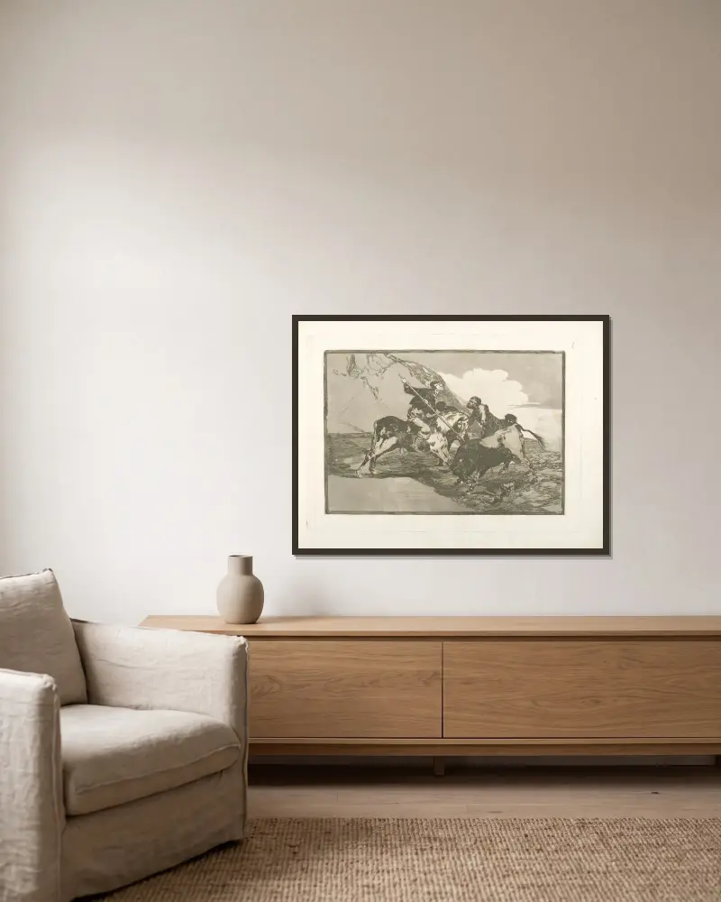 Modo con que los antiguos españoles cazaban los toros á caballo en el campo av Francisco de Goya inramad på en vägg