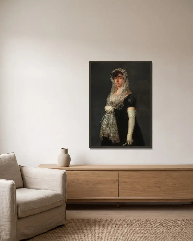 Young Lady Wearing a Mantilla and Basquina av Francisco de Goya inramad på en vägg