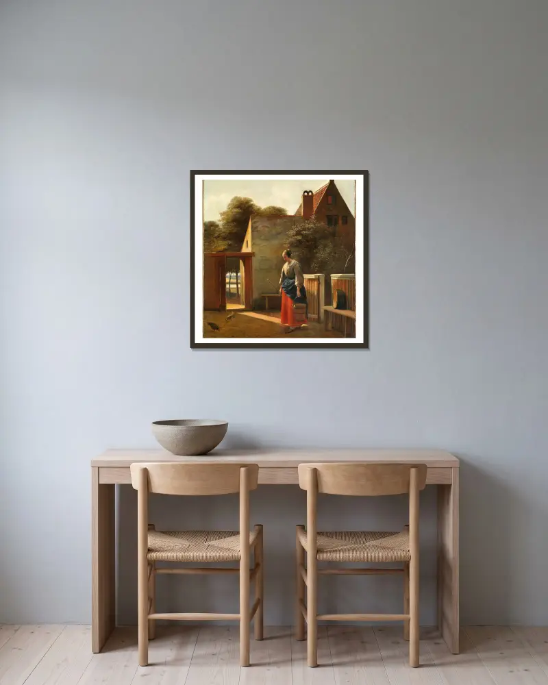 A maid with a bucket in a backyard av Pieter De Hooch inramad på en vägg