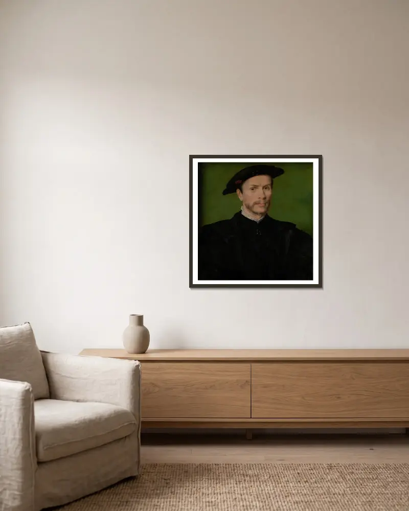 Porträt eines bärtigen Mannes in Schwarz von Corneille de Lyon gerahmt an einer Wand