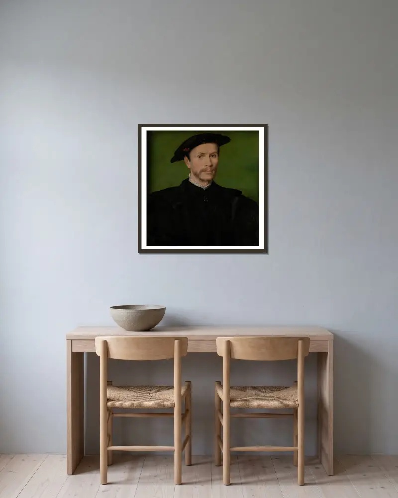 Porträt eines bärtigen Mannes in Schwarz von Corneille de Lyon gerahmt an einer Wand