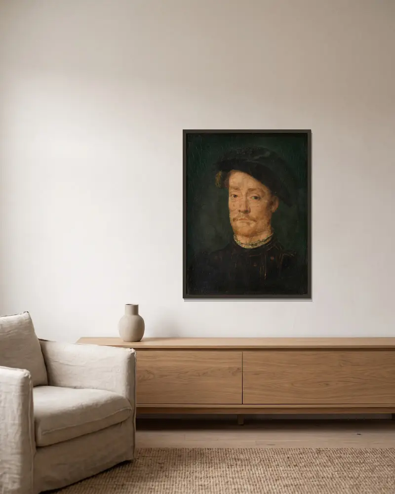 Portrait of a Man – nr 1 av Corneille de Lyon inramad på en vägg